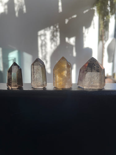Smoky Included Quartz Polished Point